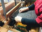 手作業で伝統の本場奄美大島紬を制作しています。